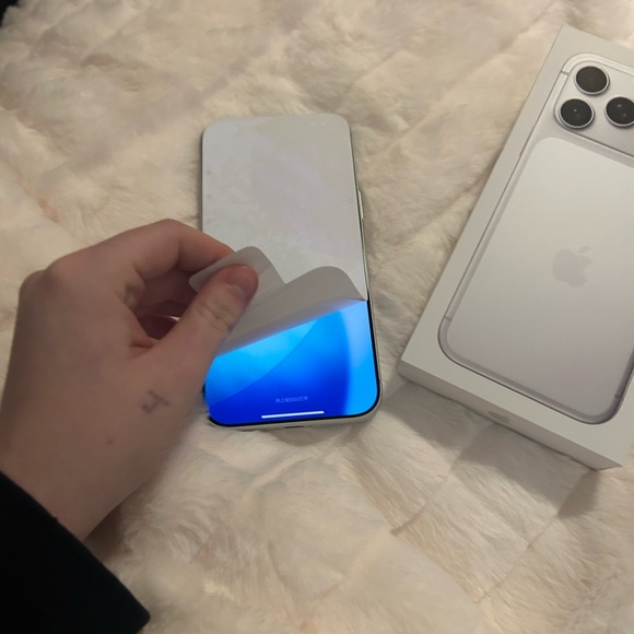 Apple iPhone with Blue Display and Silver Back